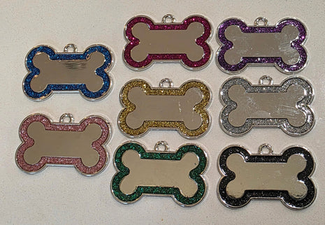 Bone-shaped dog tag featuring a glitter border